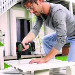 Akkuporakone Bosch UniversalDrill 18V, 2x1.5Ah akuilla, 241 tarviketta + SystemBox