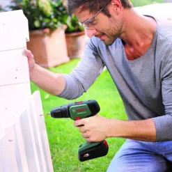 Akkuporakone Bosch UniversalDrill 18V, 2x1.5Ah akuilla, 241 tarviketta + SystemBox