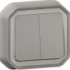 Kaksoismonitoimikytkin/-painike Legrand Plexo New 10 A IP55 uppo kiinnityskynsillä, harmaa