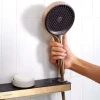 Seinäliitin Hansgrohe Rainfinity FixFit Porter 500, suihkupidike oikea, säilytyshylly, piiloasennus, harjattu pronssi